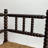 Bobbin turned corner bench with rush seat