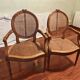 Caned armchairs