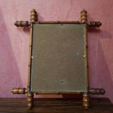 Old bamboo style wooden mirror vintage decoration