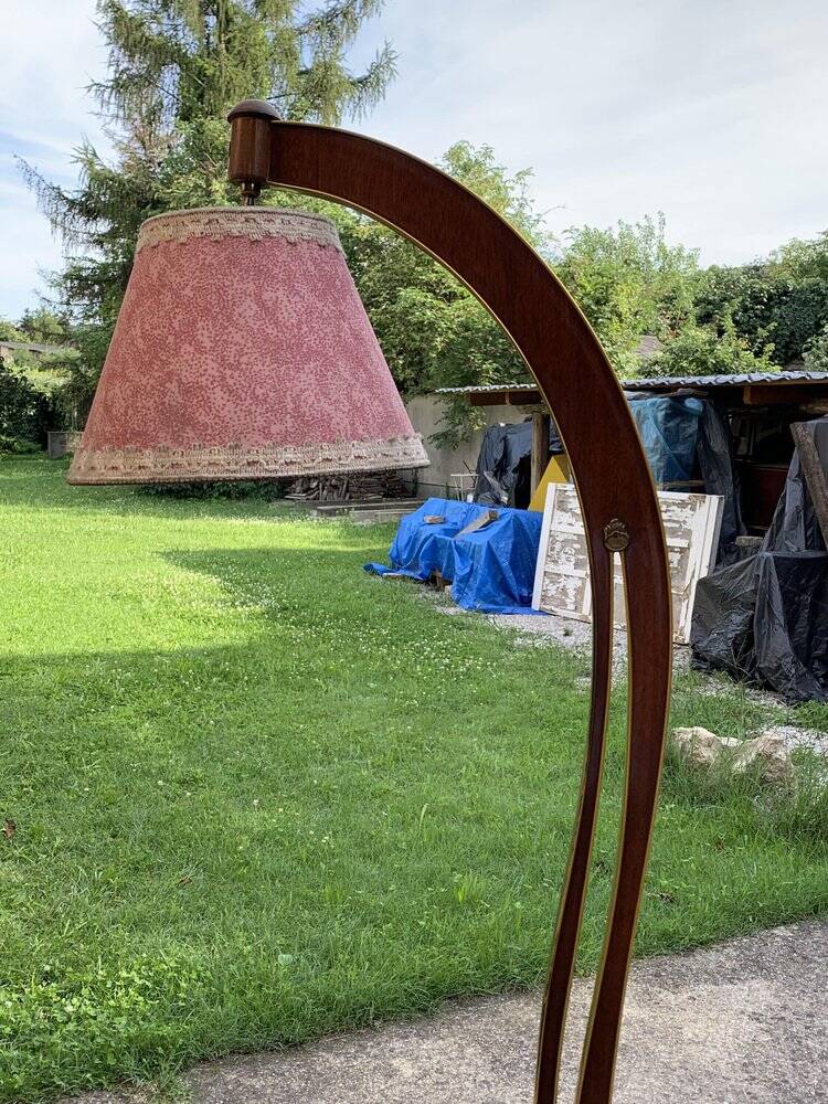 Art Deco brown walnut cocktail bar cabinet with integrated lamp and mirrored display 1950s
