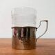 Vintage tea glasses RDA from East Germany by MUQ, Metallwarenfabrik Union Quedlinburg, set of 4.