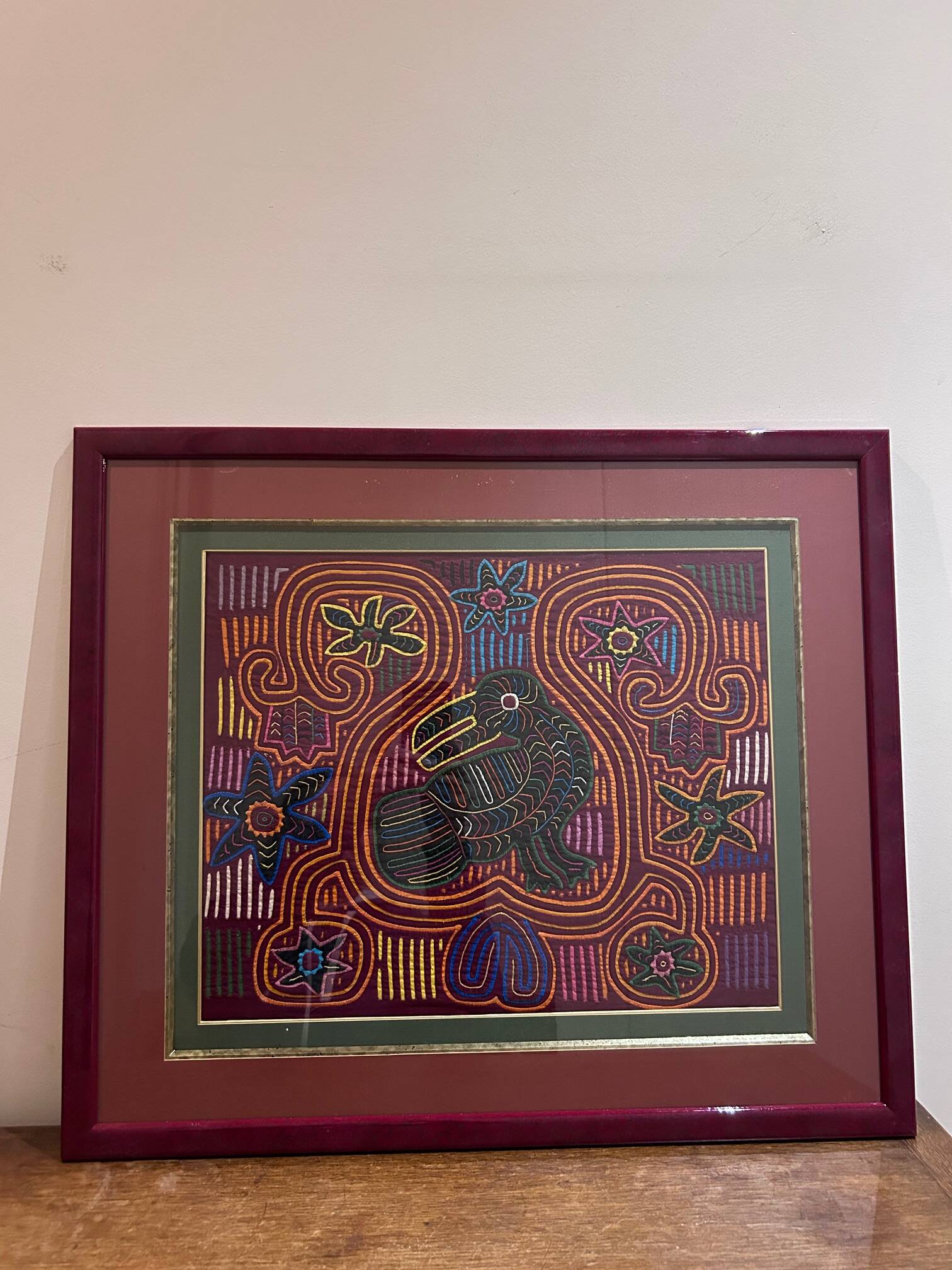 vintage tapestry framed under glass