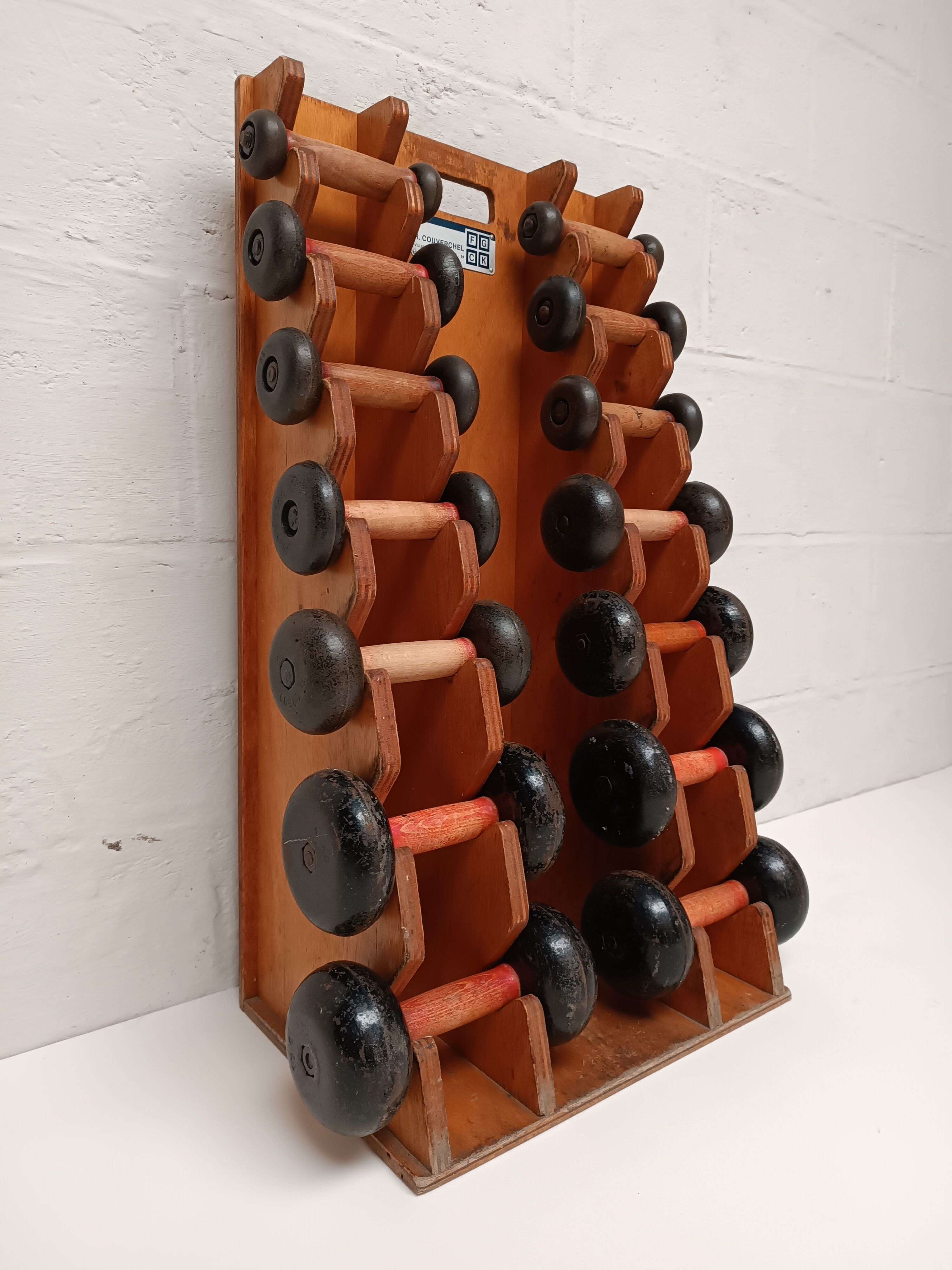 60s dumbbell wall display