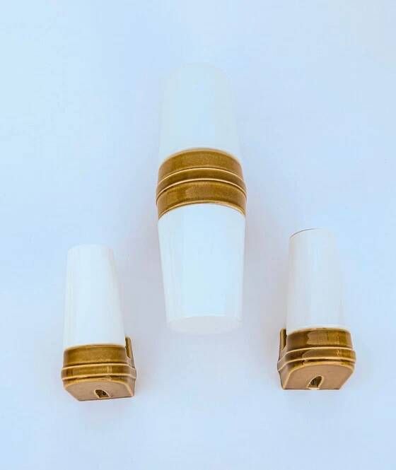 3 ochre porcelain wall sconces from the 1960s (models 6065 and 6080) by Sigvard Bernadotte for Ifö.