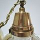 Holophane glass suspension and vintage patinated brass