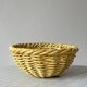 Yellow ceramic basket with wicker effect