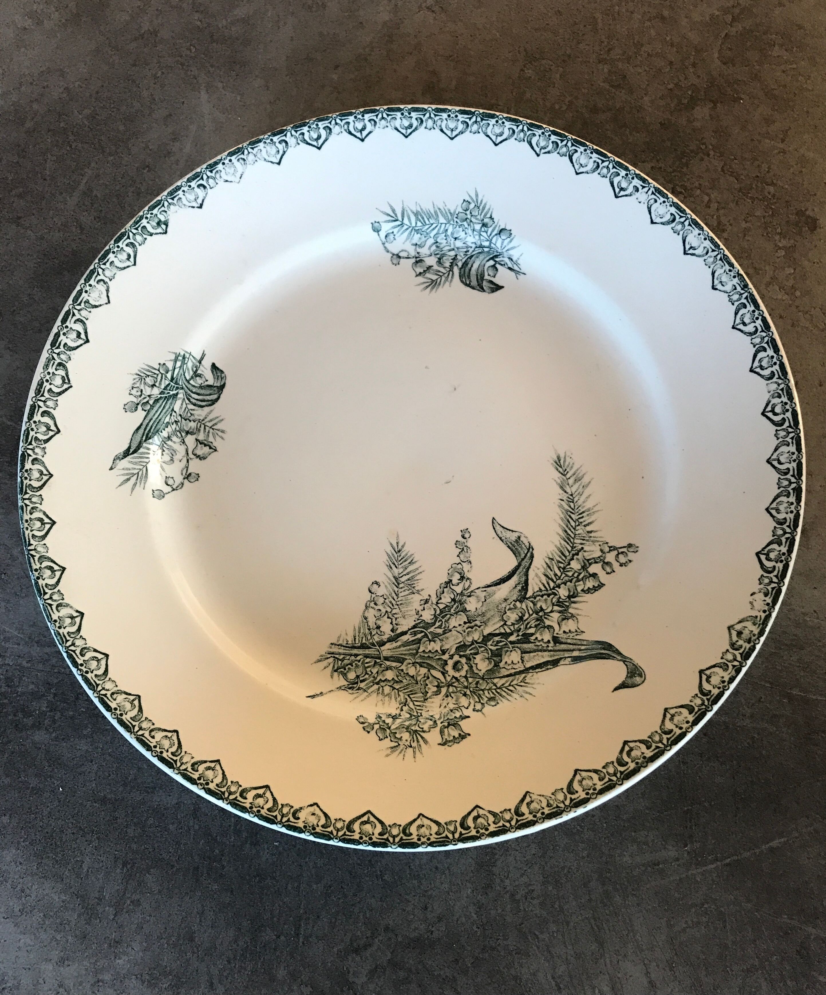 Flat hollow in earthenware st amandinoise st amand model lily of the valley