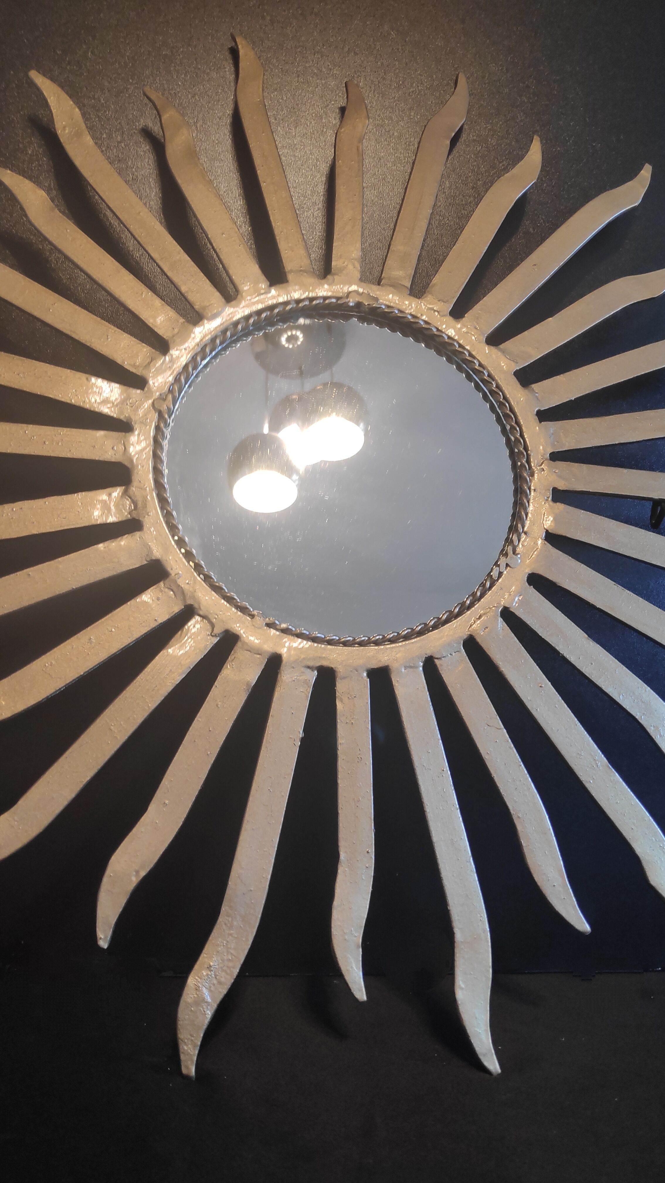 Miroir soleil en métal doré