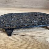 Dessous de plat en fonte