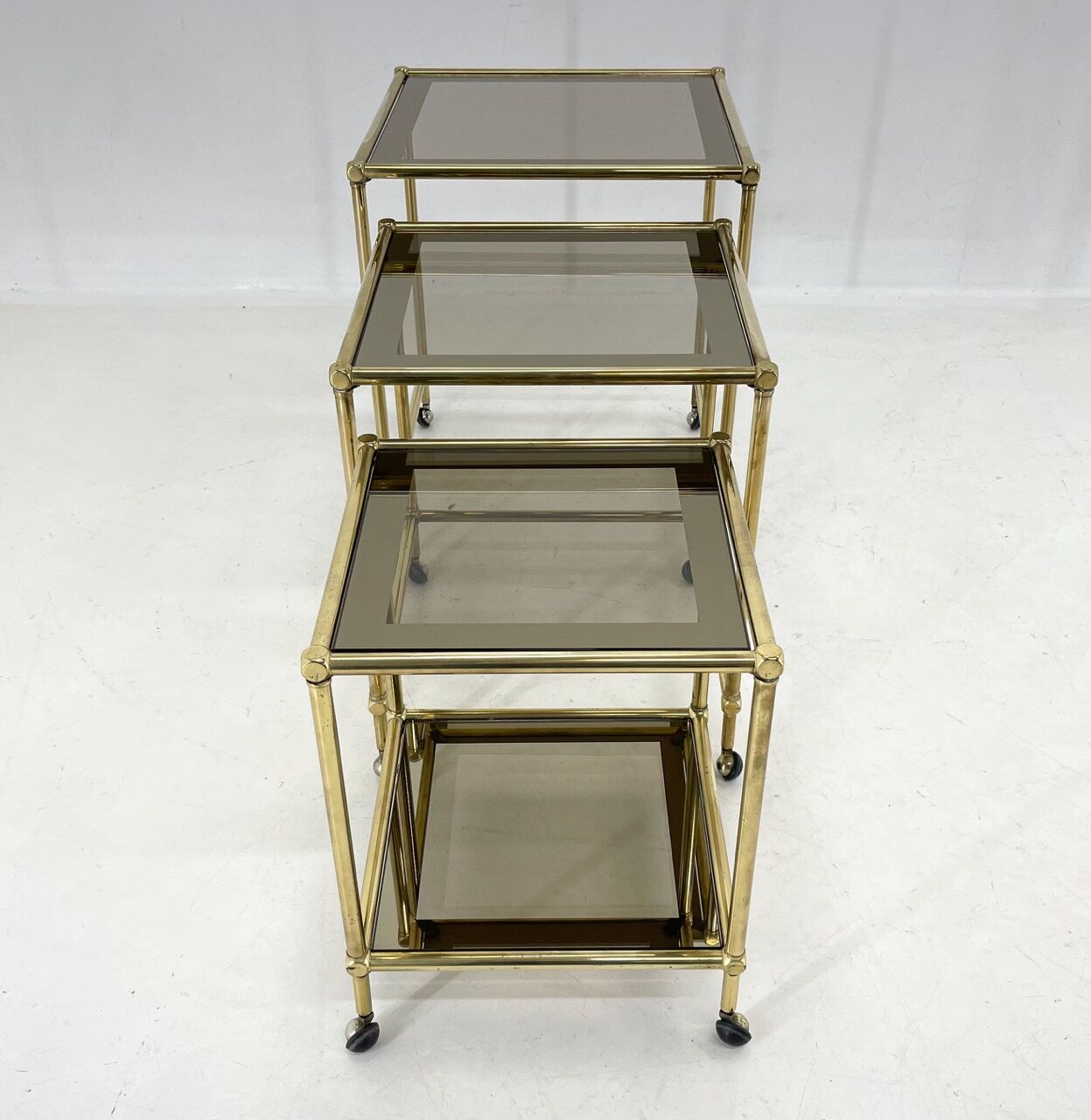 1970's italian brass & smoked glass nesting tables