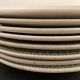 8 flat plates in opaque porcelain from Gien Terre de Fer, model Lauriers, XXth