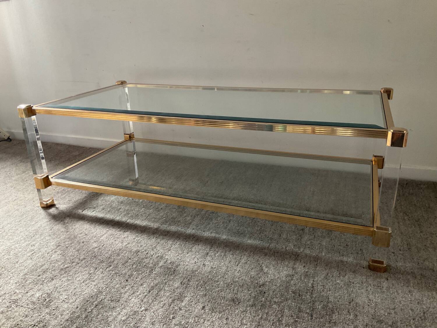 Vintage lucite and brass coffee table from the 70s