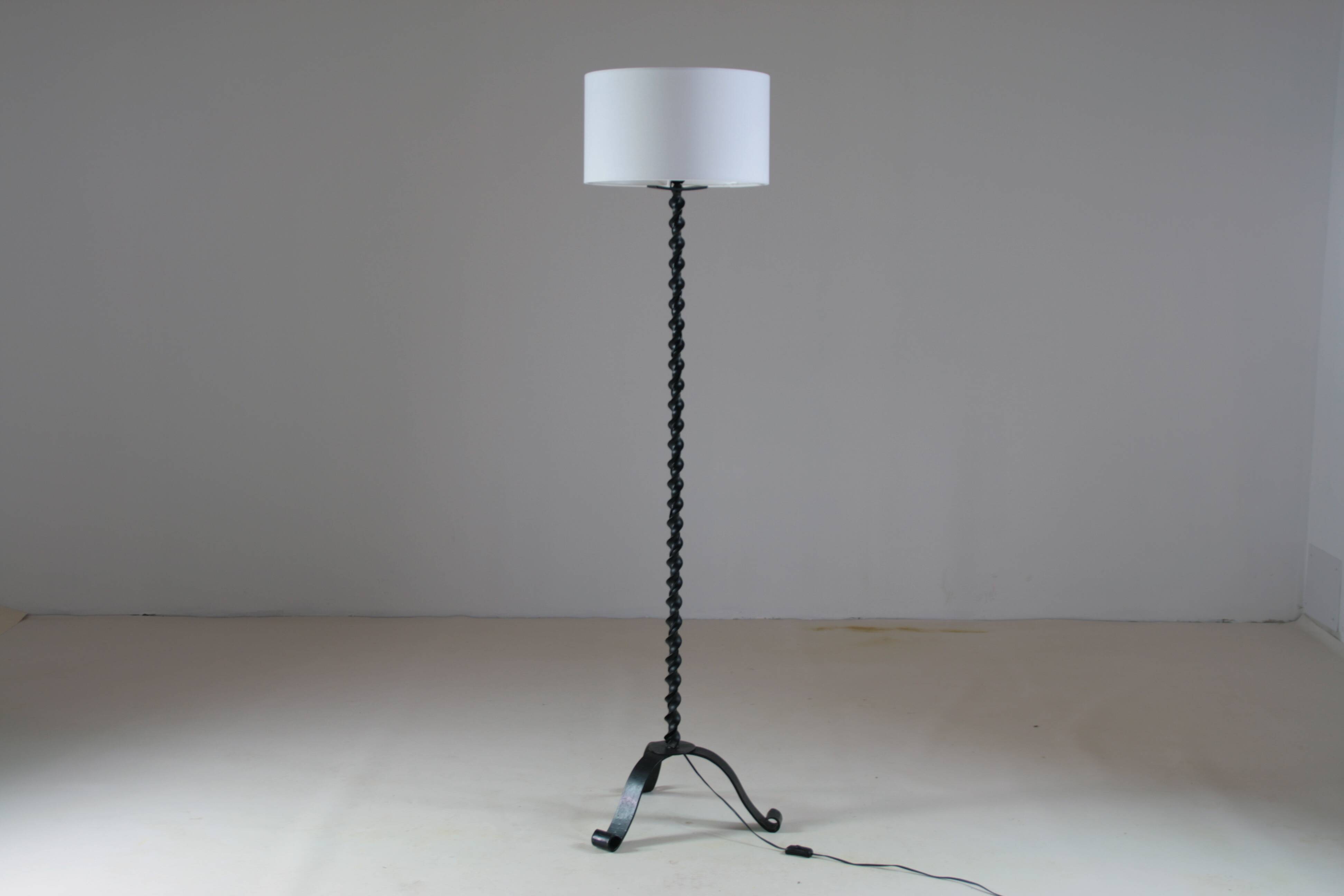 Twisted black metal brutalist floor lamp