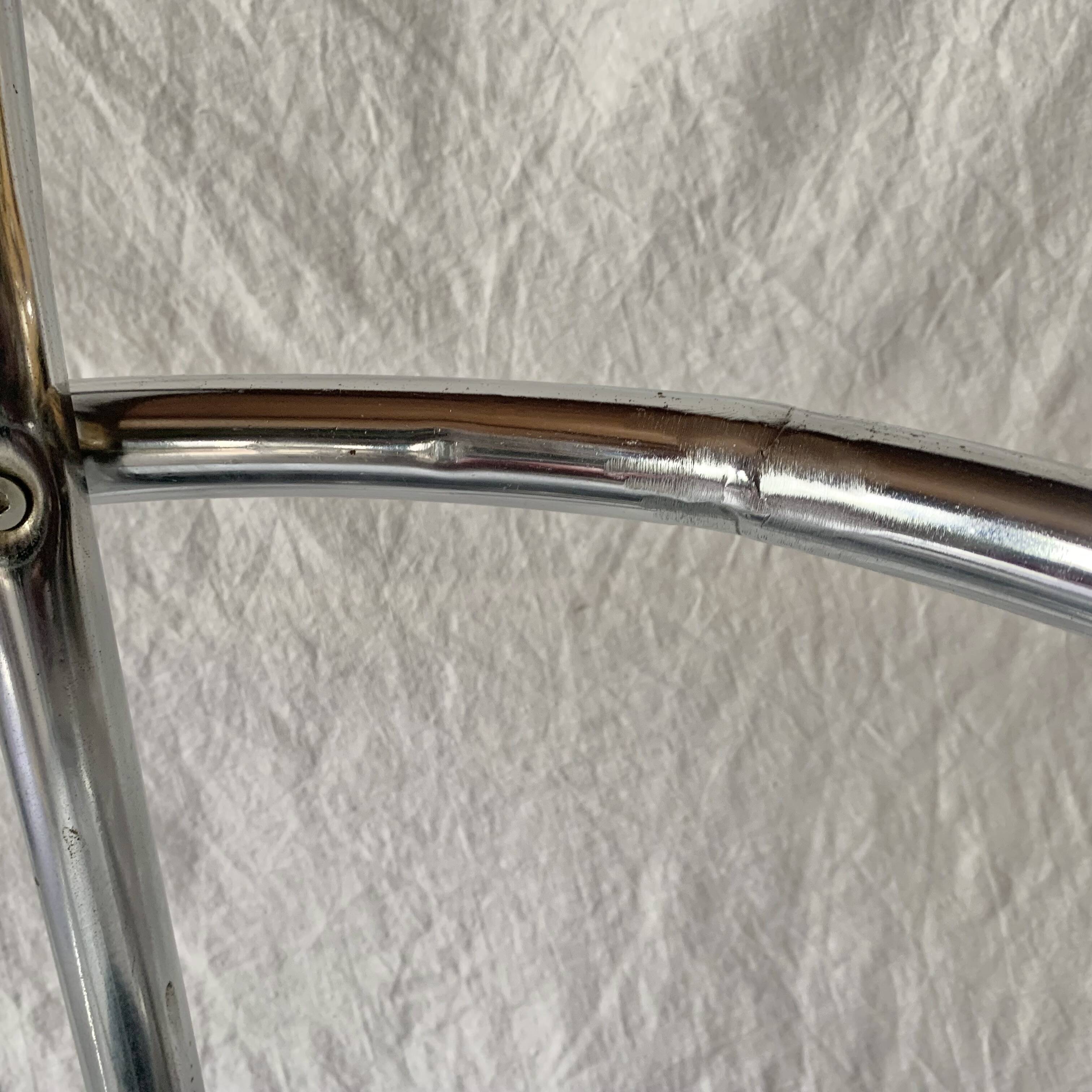 Vintage bar stool in black skai and chrome metal