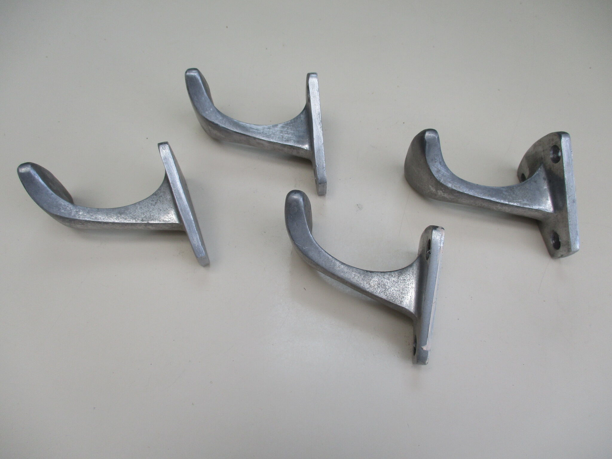 4 PATERES made of aluminum cast industrial design