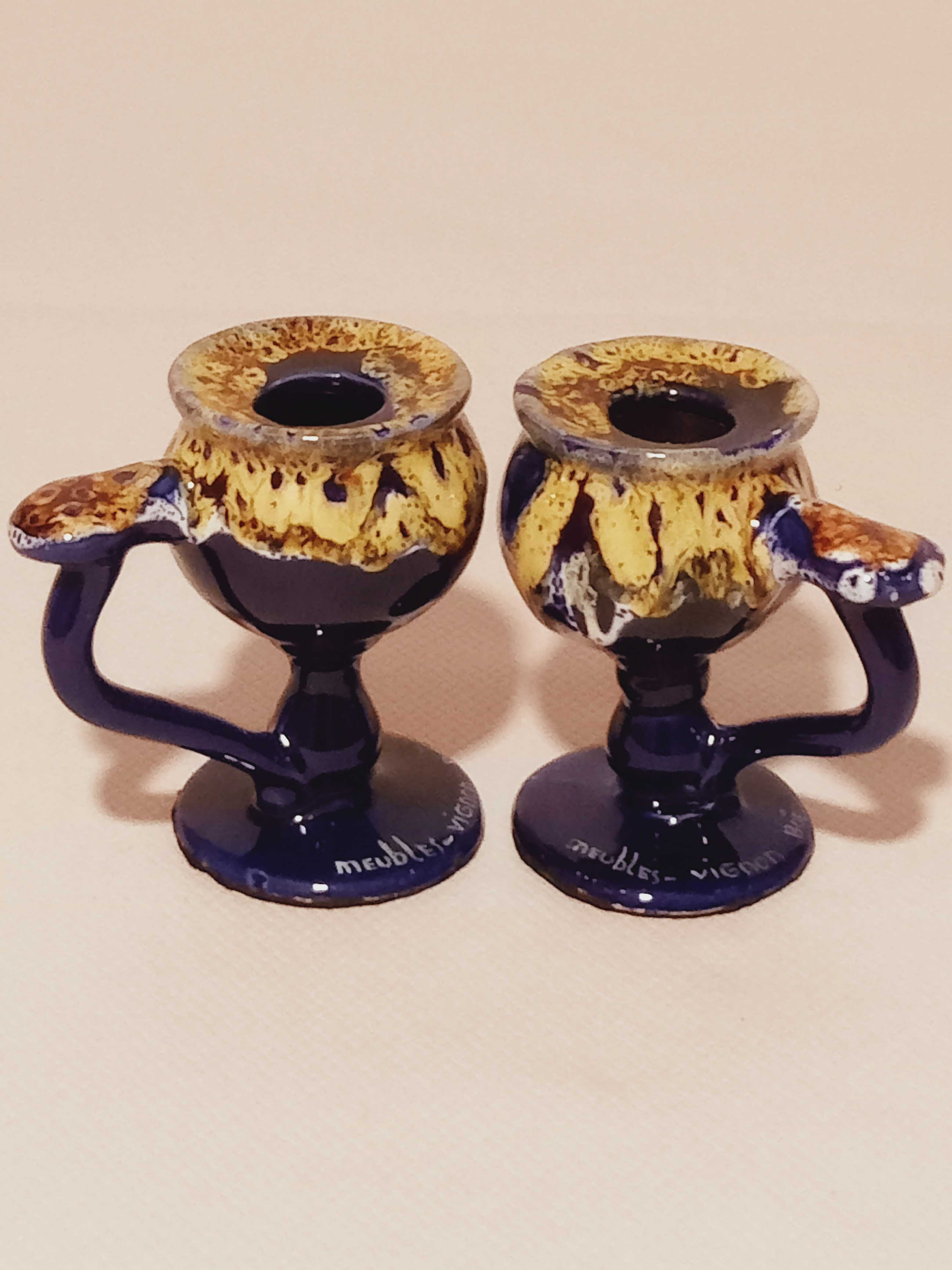 Pair of ceramic candle holders