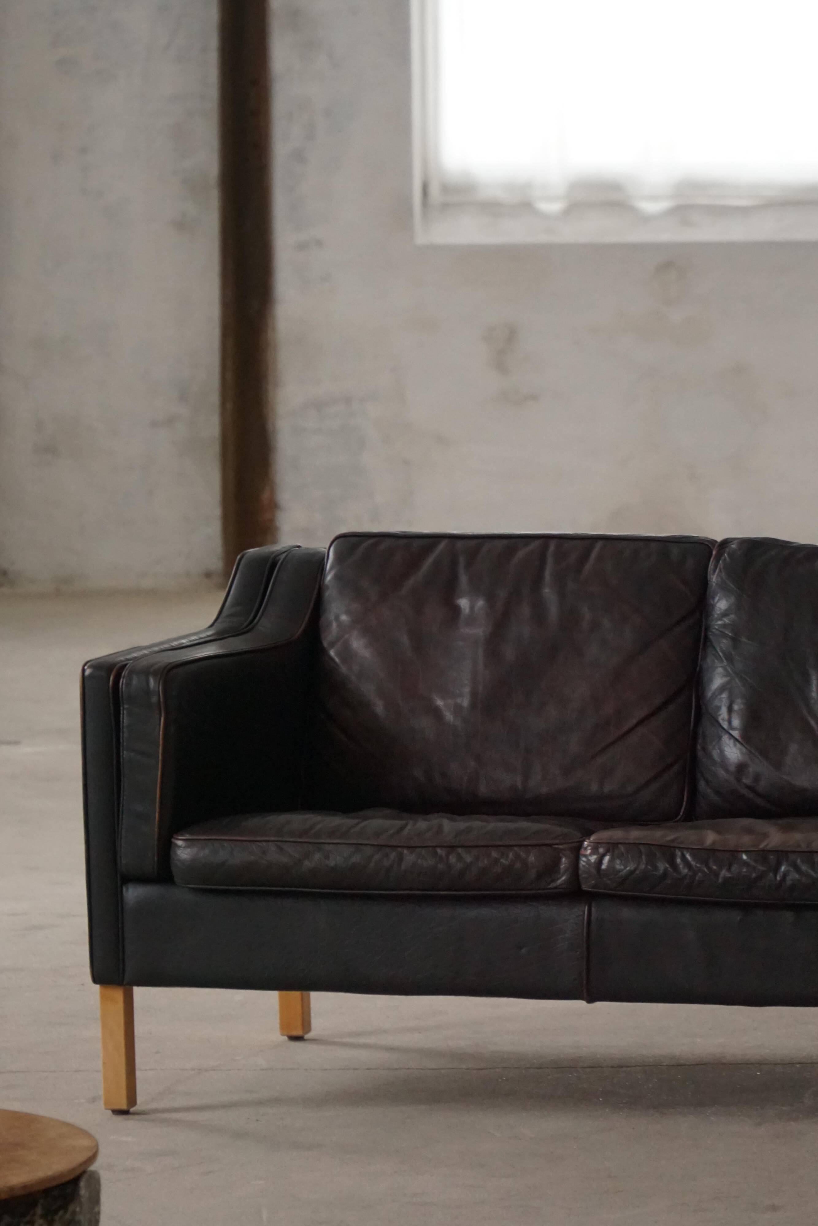 Mogens Hansen, 2-seater canapé mid-century, patinated black leather, 1970s.