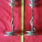 Pair of bronze candlesticks depicting a snake