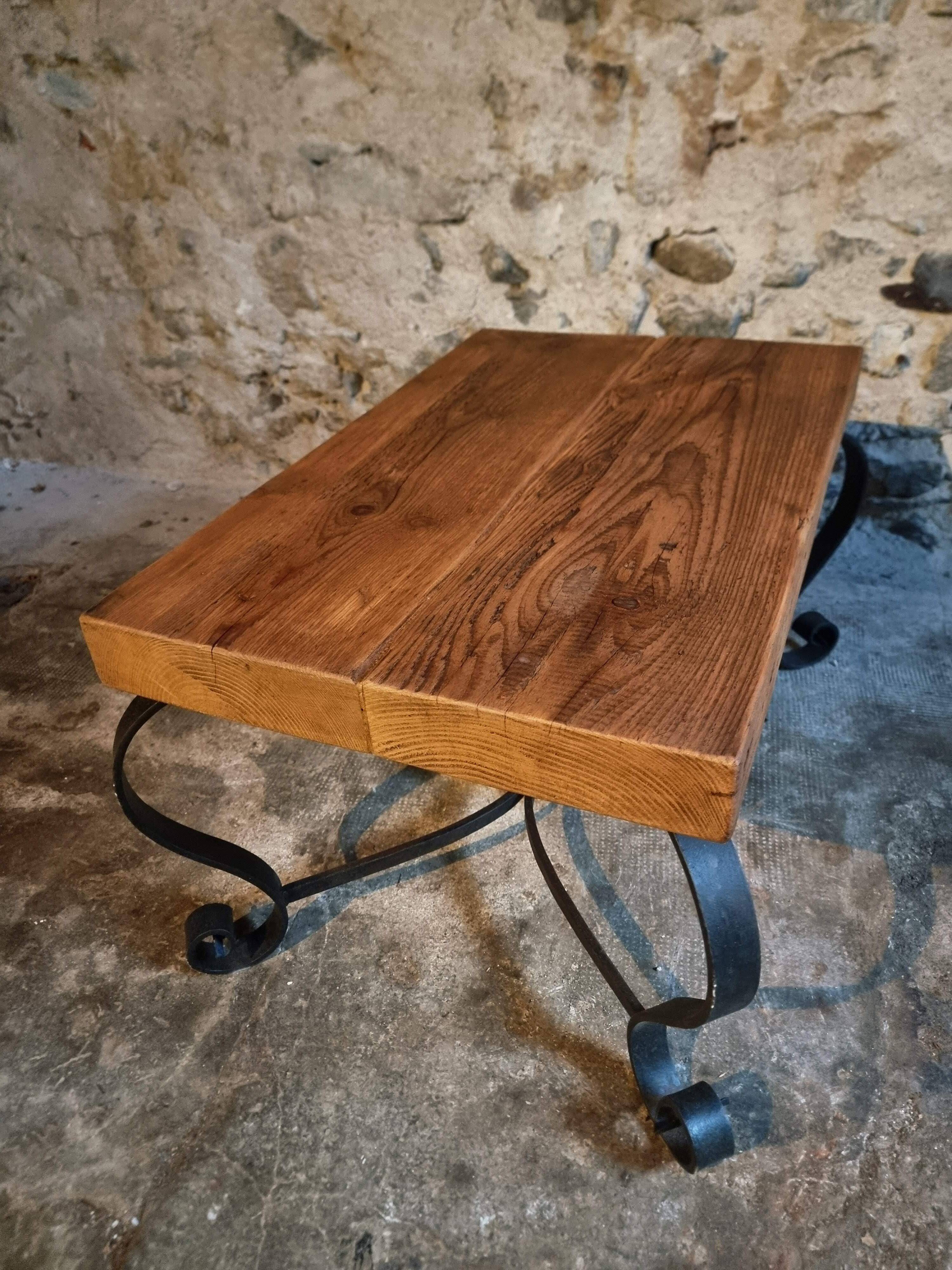 Vintage French coffee table from the 1960s – Rustic pine coffee table with a black iron base.