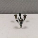 Small candle holder in tarnished silver, with place for three small candles