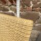 Pair of colonial-style rattan and wood armchairs