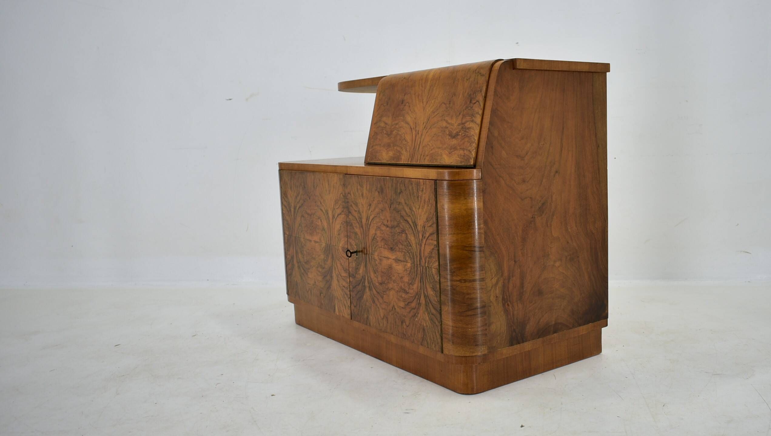 Art Deco cabinet from 1940 made of walnut for UP Závody, Czechoslovakia.