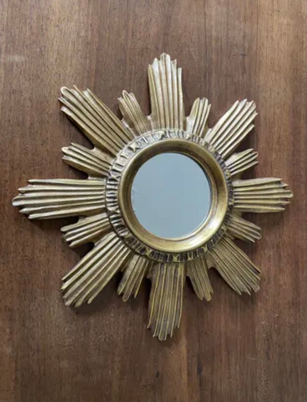 Vintage sun mirror in golden resin 60s/70s