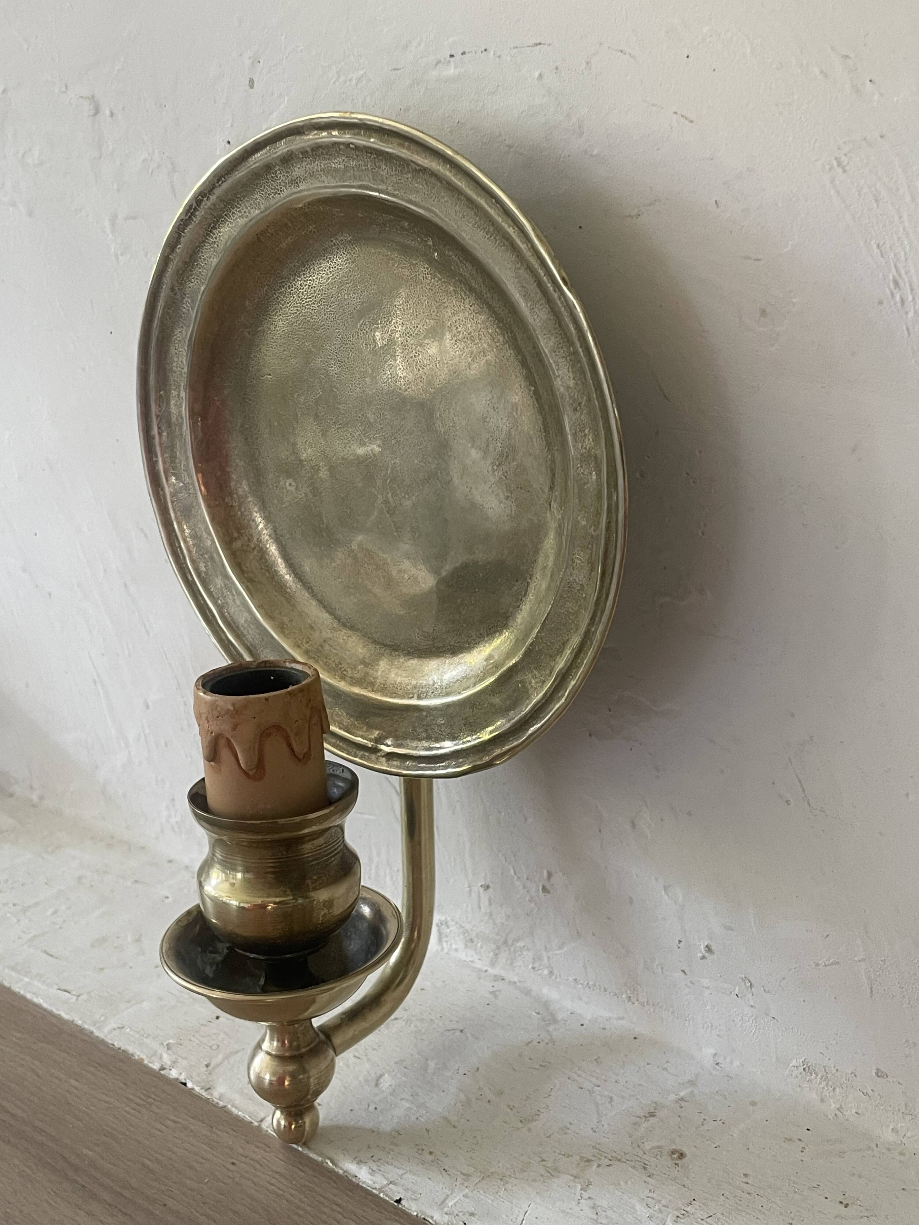 Pair of vintage wall sconces in textured brass, brutalist style.