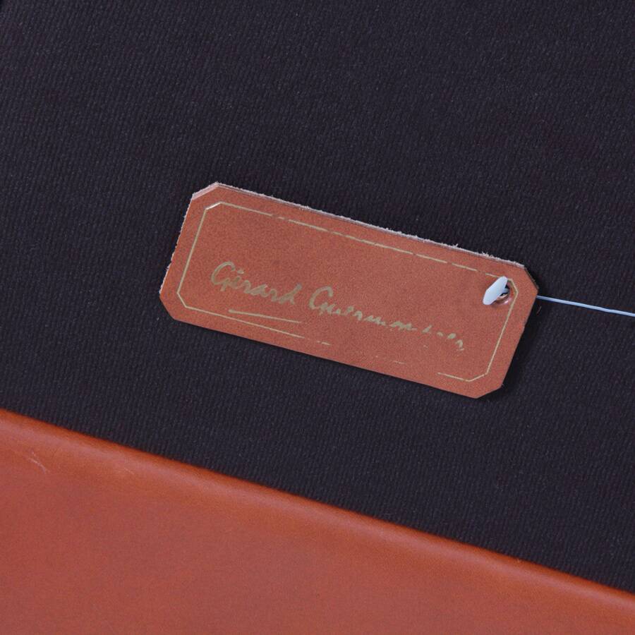 Leather armchair by Gérard Guermonprez, 1970