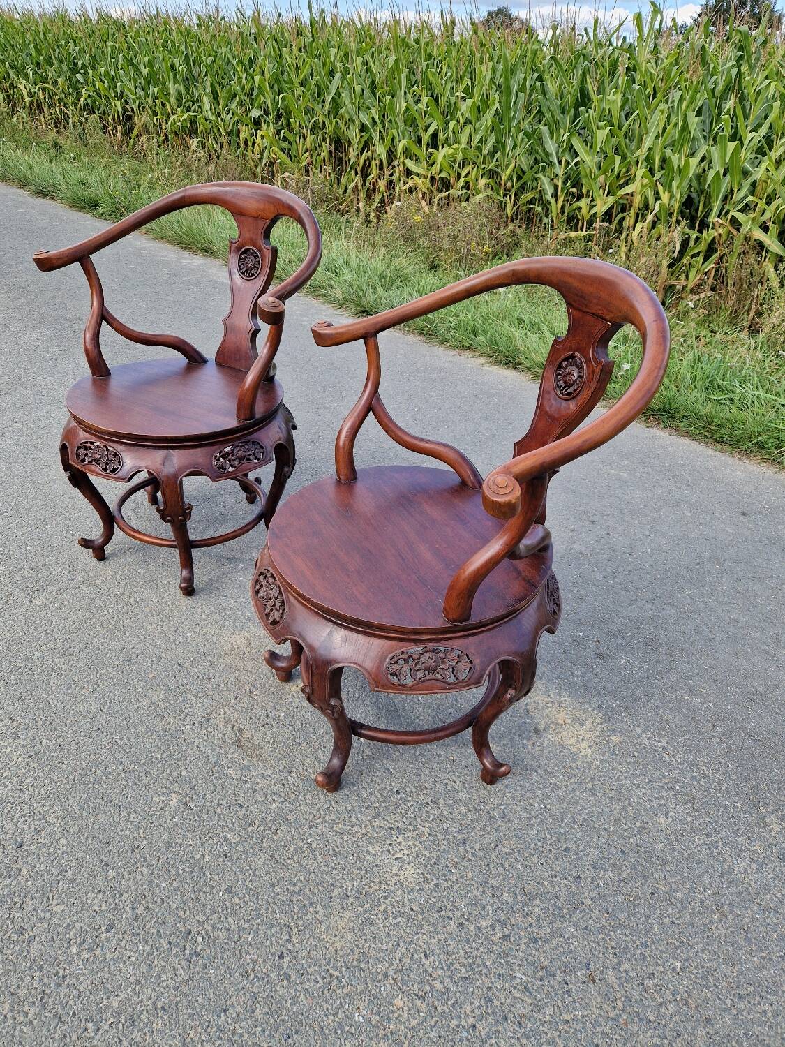 Pair of antique Chinese carved mahogany armchairs, circa 1960s