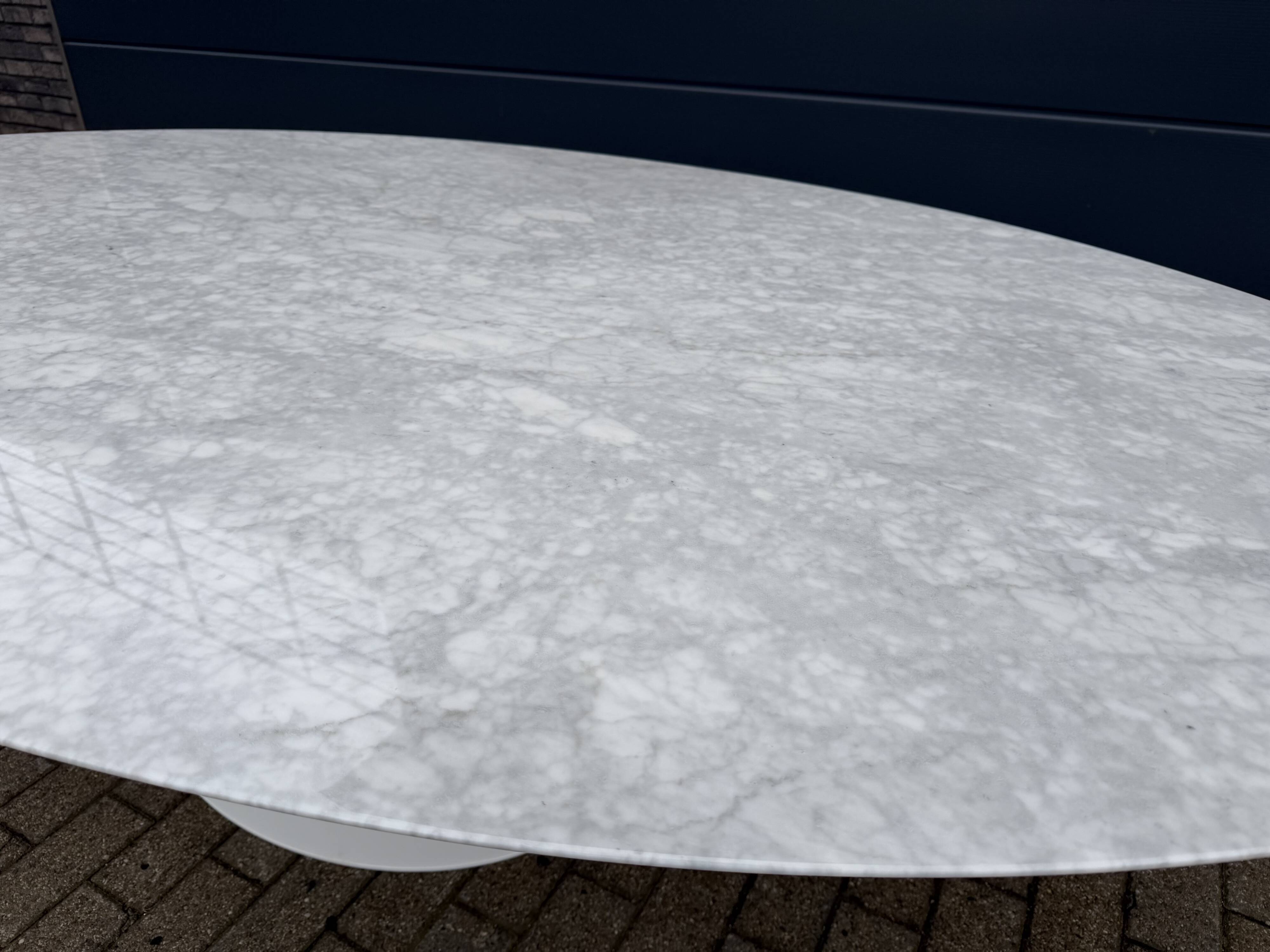 Original Knoll Tulip oval dining table (244cm) in Carrara marble.