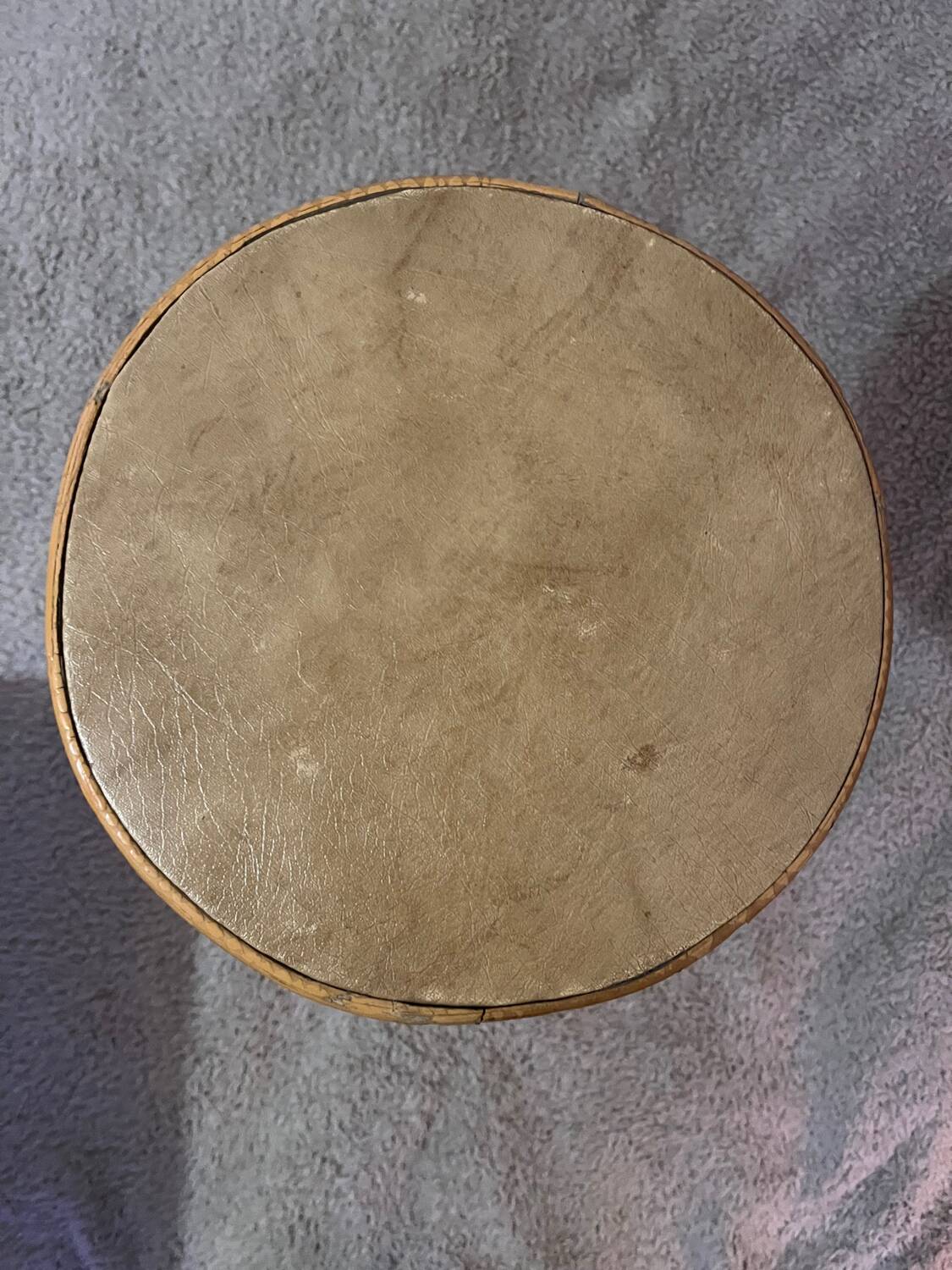 Plant holder or side table at the end of a bamboo sofa