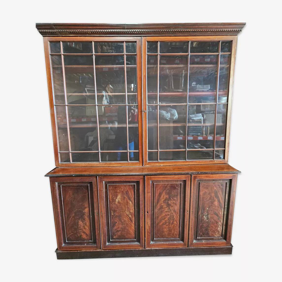 English library in mahogany with drawers