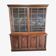 English library in mahogany with drawers