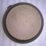 Vintage green enameled ceramic ashtray signed.