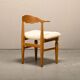 Henning Kjærnulf dining chairs set in Oak and Sheepskin, Denmark, 1960s
