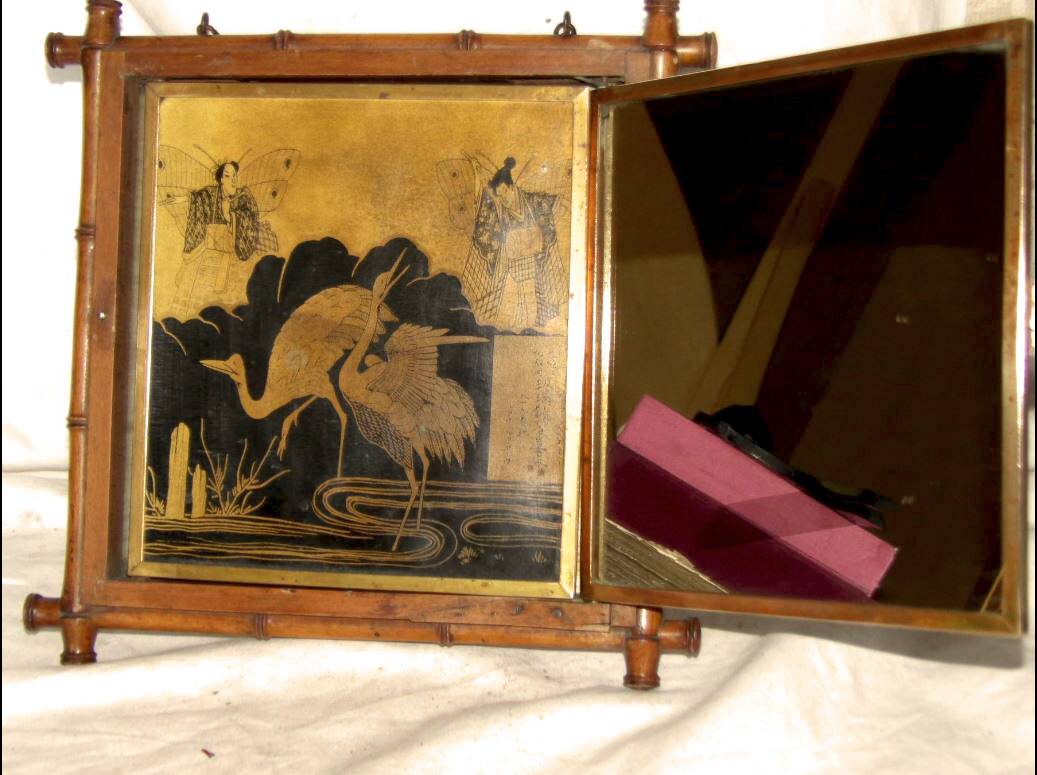 Beveled mercury mirror and japanese art nouveau illustration on the back