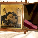 Beveled mercury mirror and japanese art nouveau illustration on the back