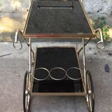 Rolling serving table glass and brass