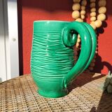Green glazed ceramic pitcher