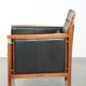 Fauteuil en cuir noir de style Art Déco en bon état.