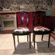Pair of Hepplewhite neoclassical style chairs, relooked in black lacquer and faux leather.
