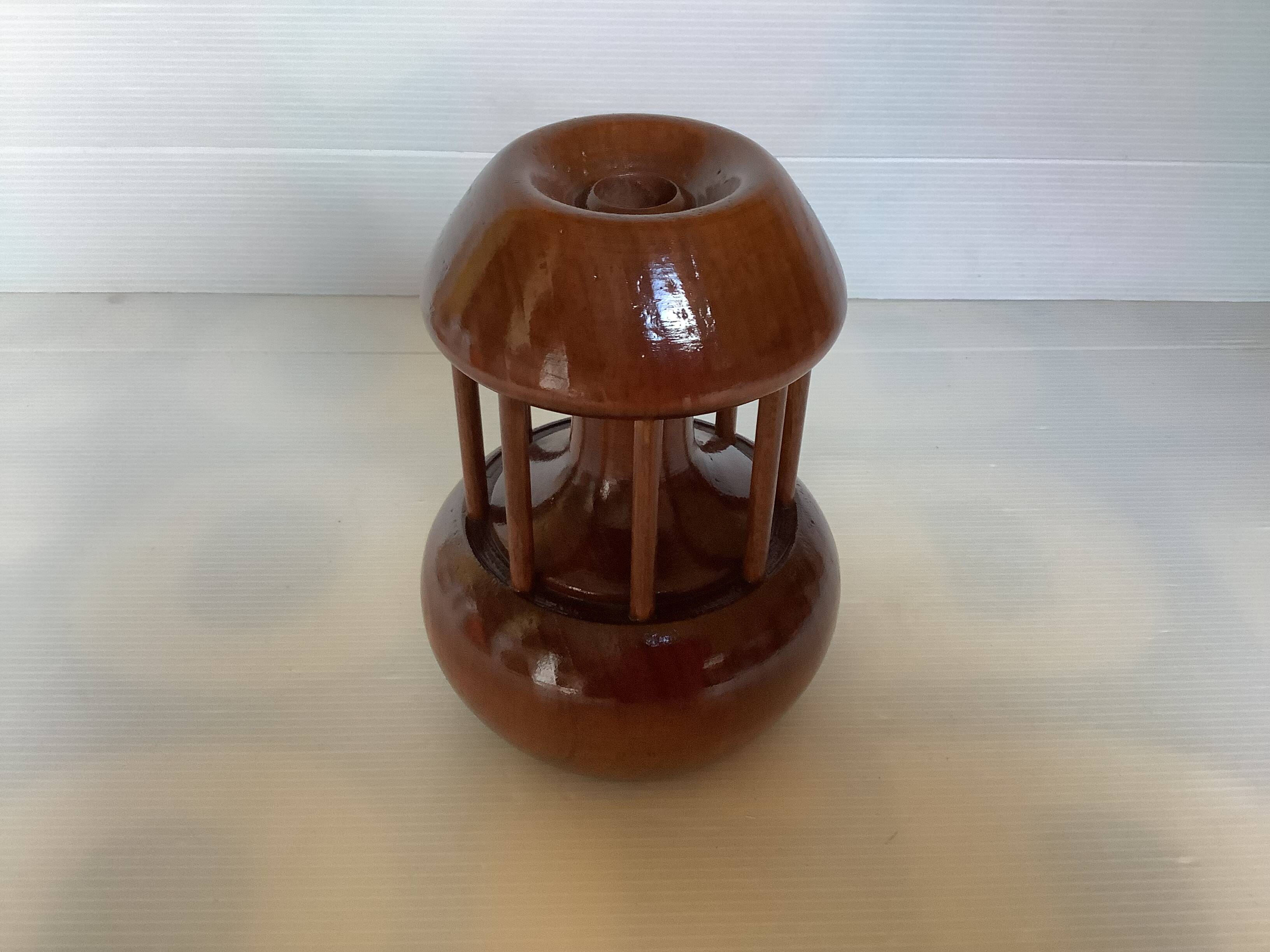Varnished wooden candle holder