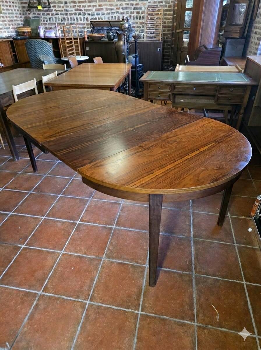 Scandinavian extendable table in rosewood from the 1960s, with 2 extensions.