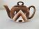 Small selfish teapot graphic brown gradient – 1970s