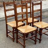 4 solid wood chairs with straw seats and high backs, 108cm.