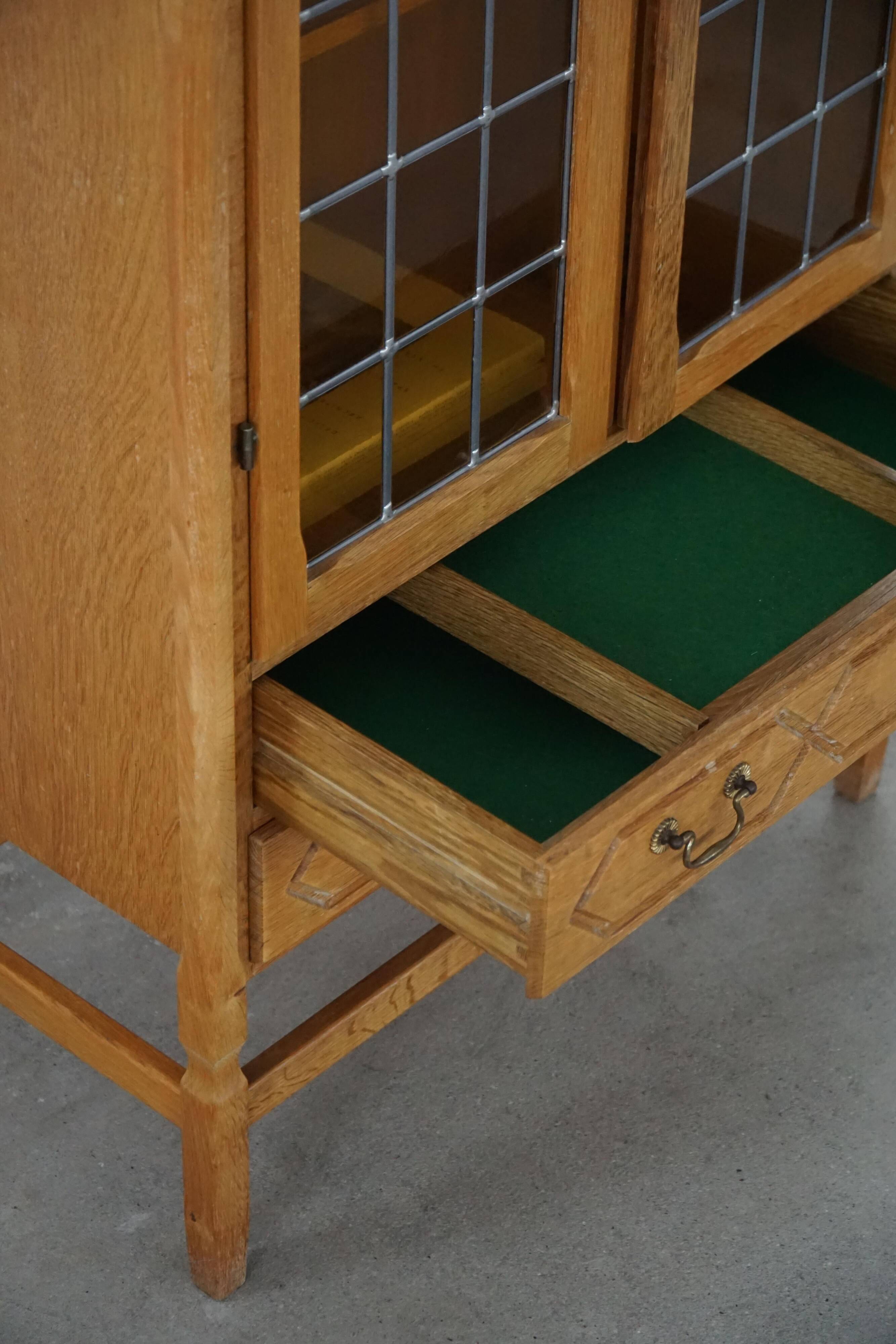 Danish oak display cabinet from the mid-century modern period with leaded glass, 1960s.
