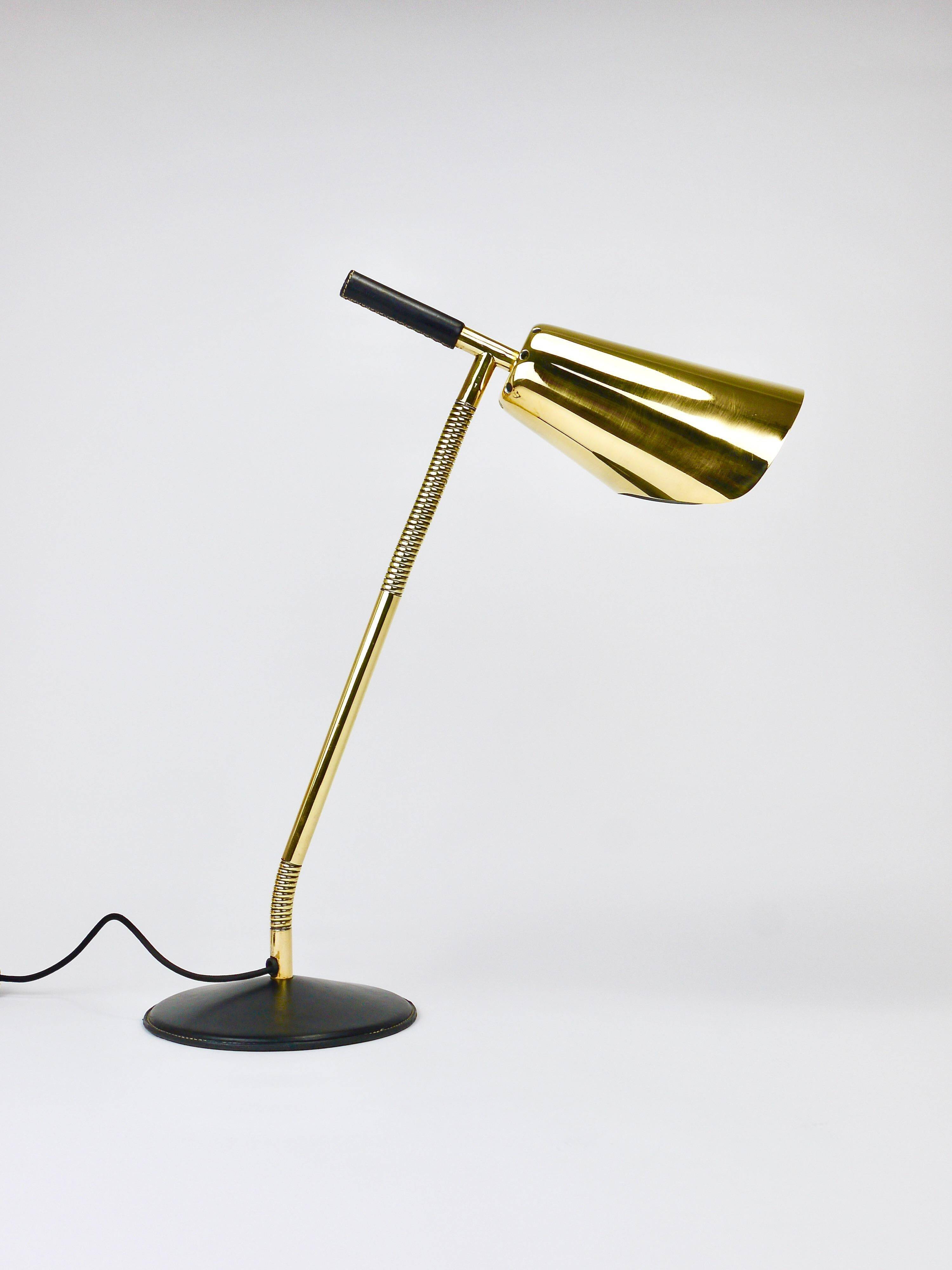 Rare desk and table lamp in brass and leather by Carl Aubock II #4280, Vienna, Austria.