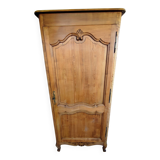 Louis XV rustic bonnetière in solid cherry wood, late 19th to early 20th century.