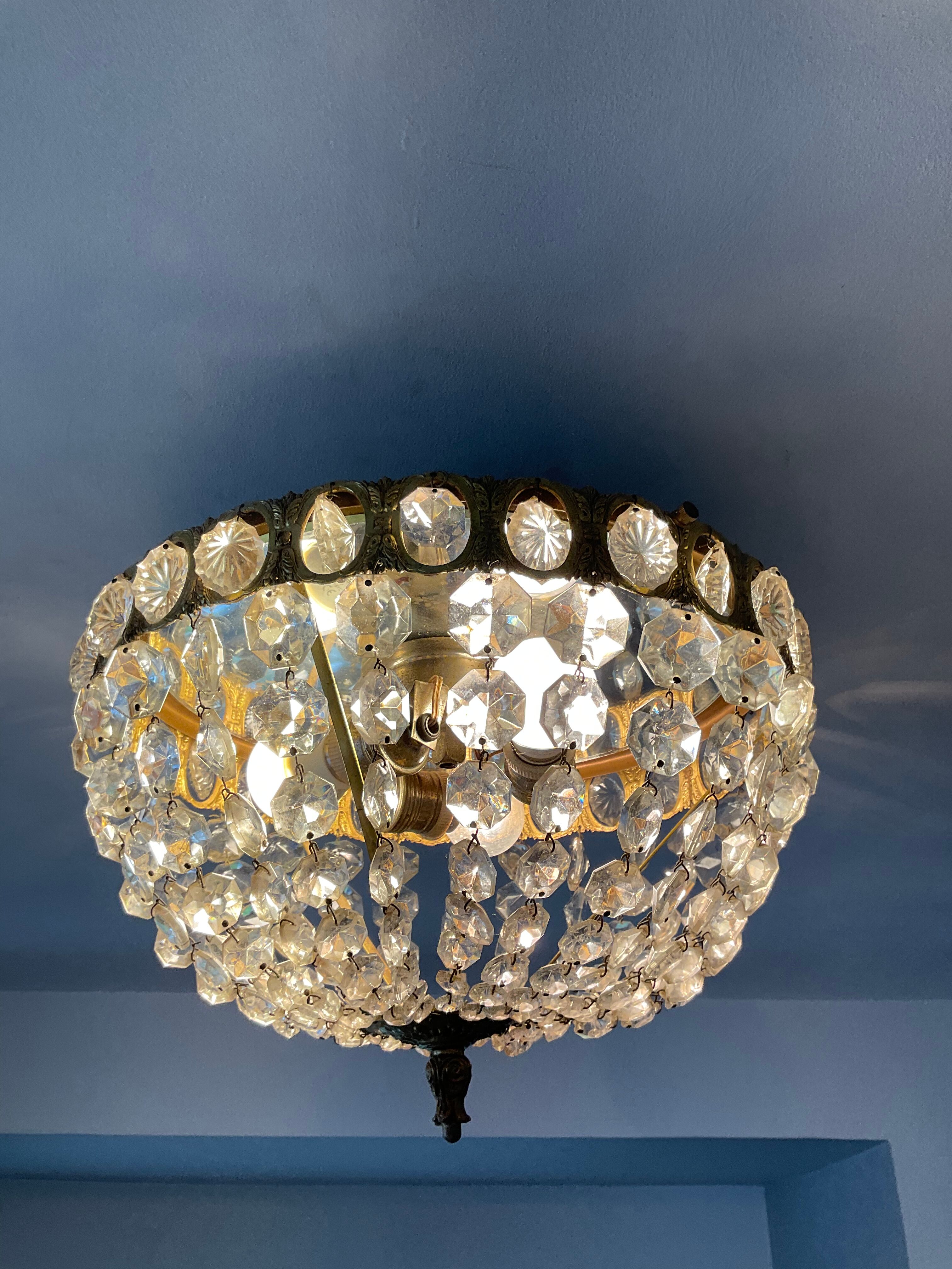 Old ceiling lamp basket in bronze and grapevines